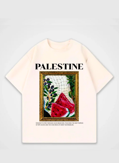 Palestine T-shirt featuring framed artwork with watermelon, olives, and keffiyeh pattern – symbolic streetwear design by Peacemaker promoting peace and freedom